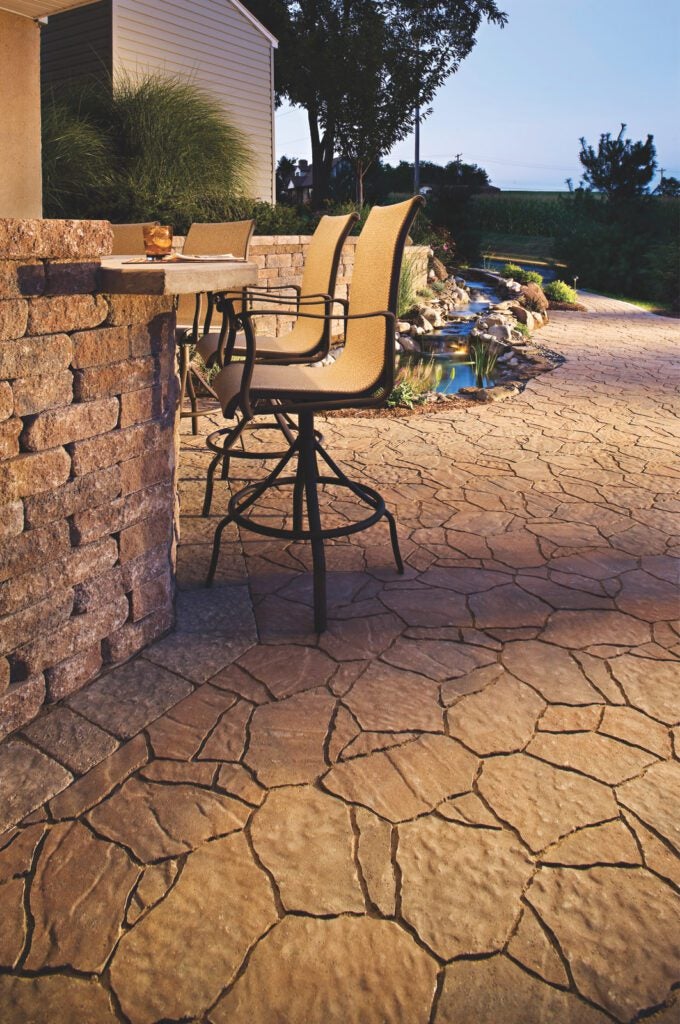 Asymmetrically shaped paver patterns