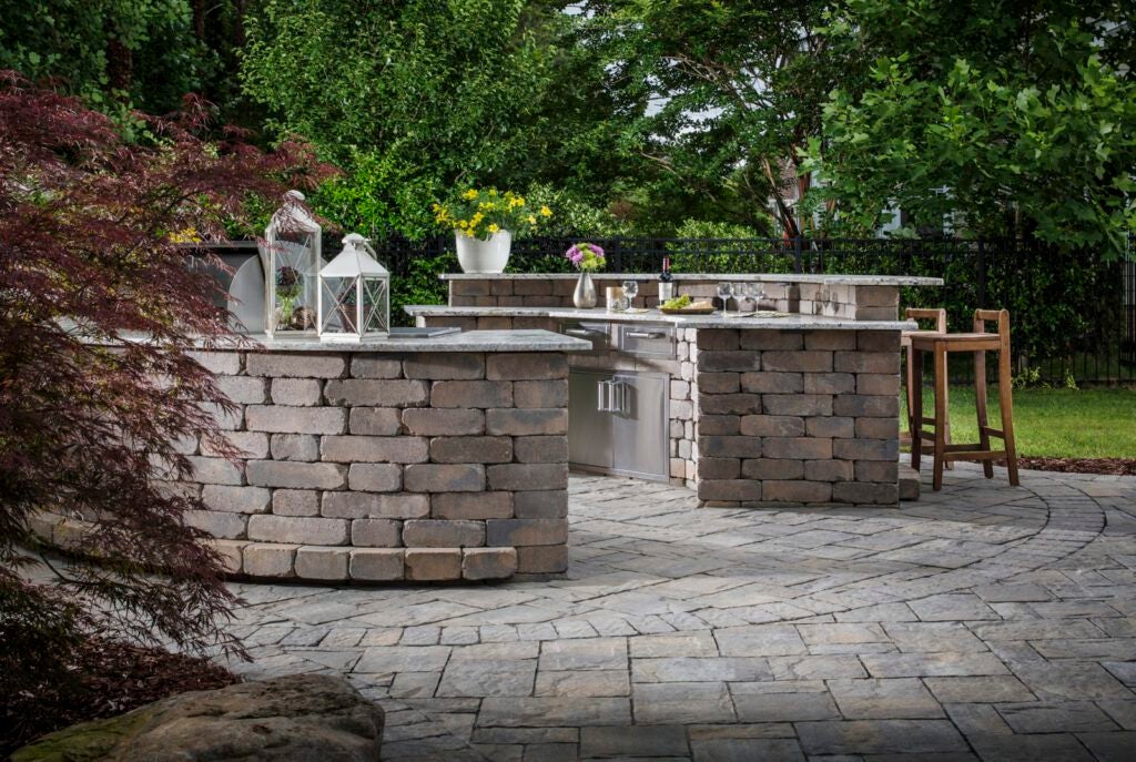 Outdoor kitchen and bar with warm tones