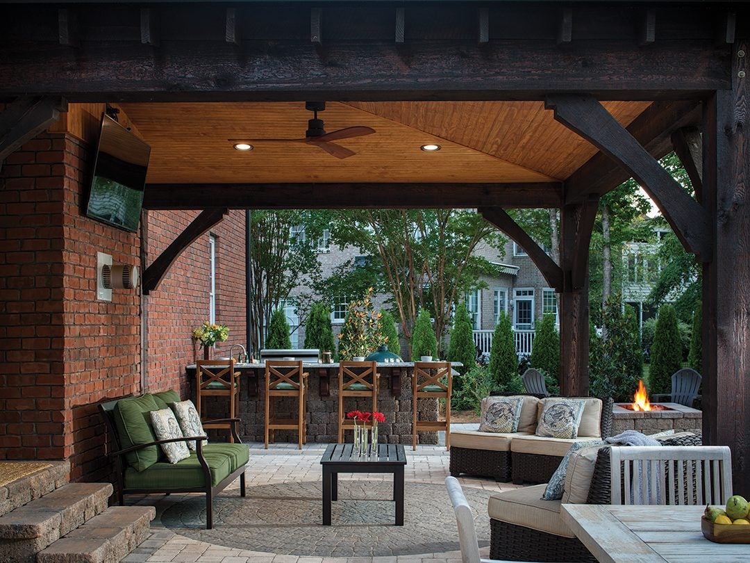 outdoor kitchen with fireplace