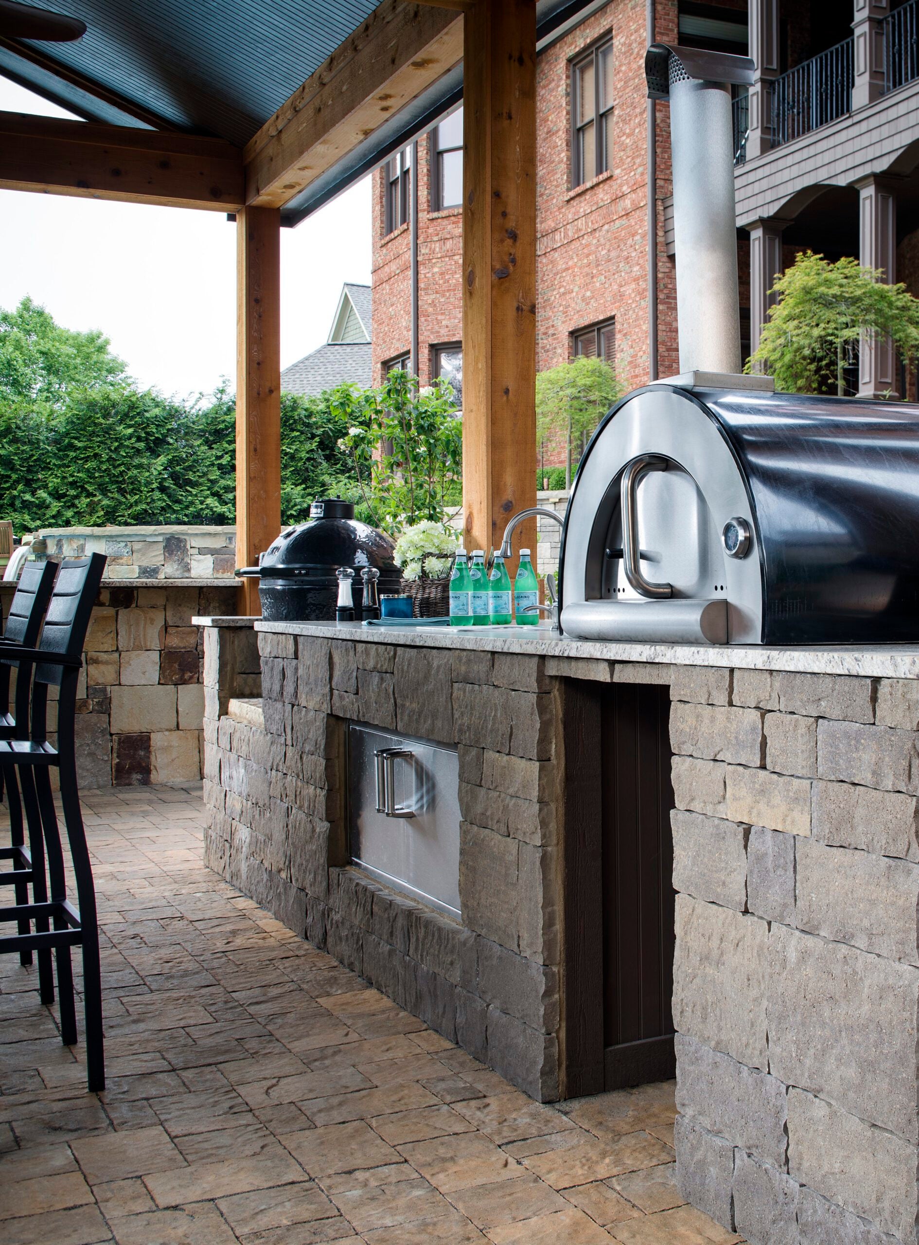 terrace designs add form and function. outdoor kitchen with multiple cooking options