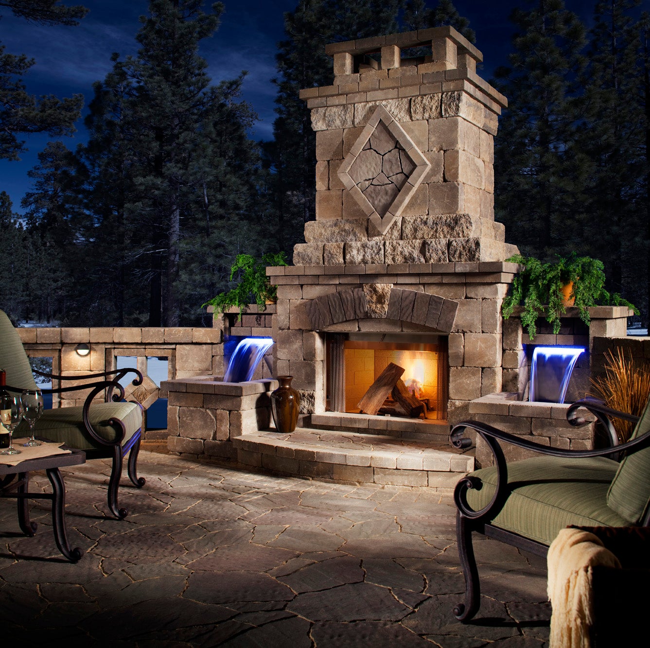 This outdoor living room incorporates several units from the Bristol Belgard Elements collection of prefabricated outdoor living features.