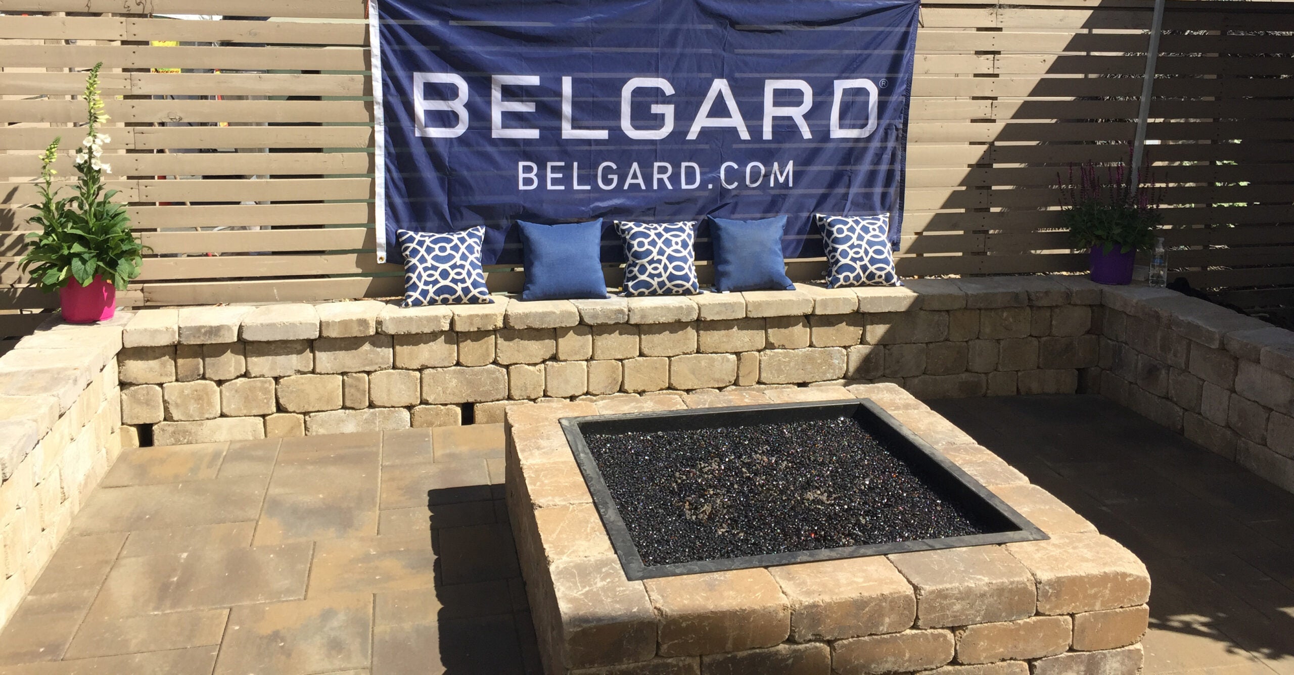 The Belgard booth was located in Sunset Celebration Beer Garden and featured a Weston Stone® fire pit surrounded by Lafitt® Rustic Slab pavers and a ???? seat wall.