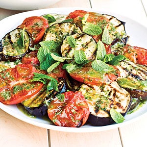 Grilled eggplant and tomato salad drizzled with lemony vinaigrette and topped with fresh mint. (photo by Iain Bagwell)