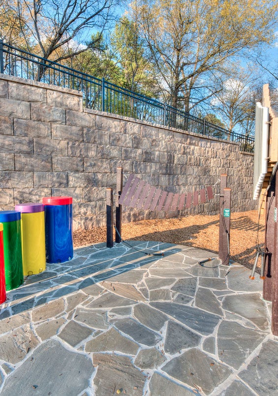 A Mega-Tandem™ retaining wall provides an acoustic backdrop for one of the park's harmony stations. (Photo: Carson Matthews)