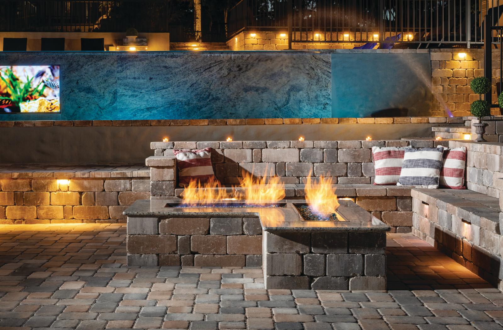 cobbled paver patio with custom fire table