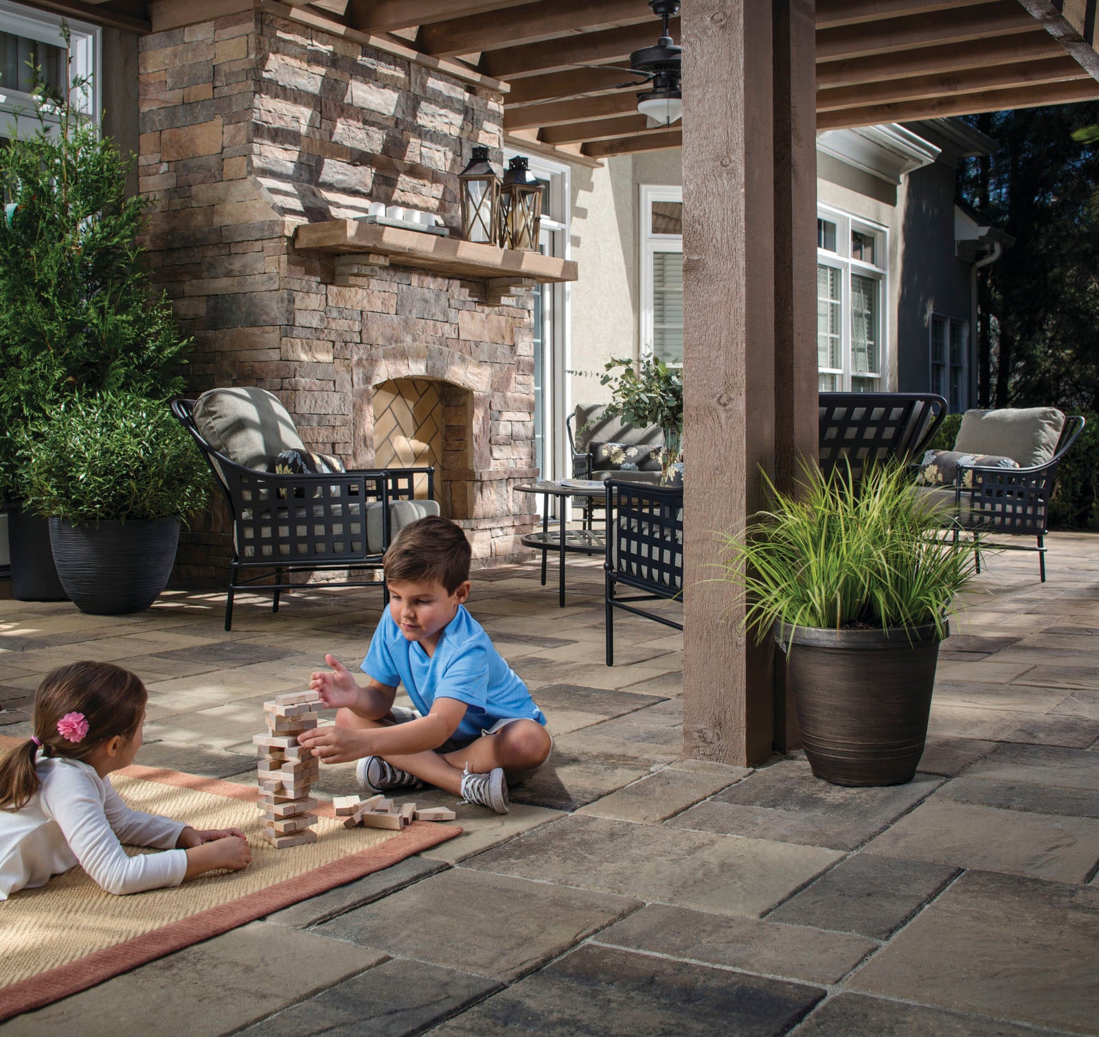 Lafitt Rustic Slab Outdoor Living Room with pergola 