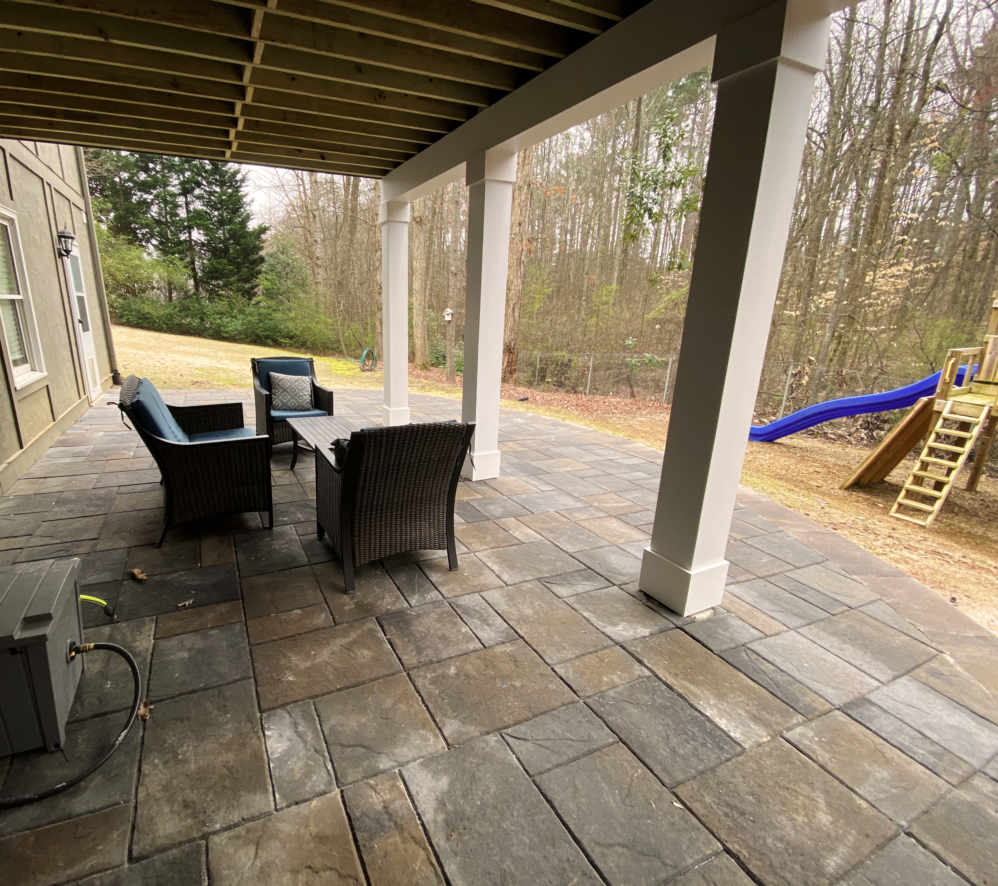 Covered Belgard paver patio with natural color blends