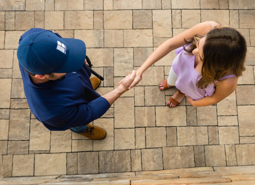 Belgard contractor shaking hands with customer