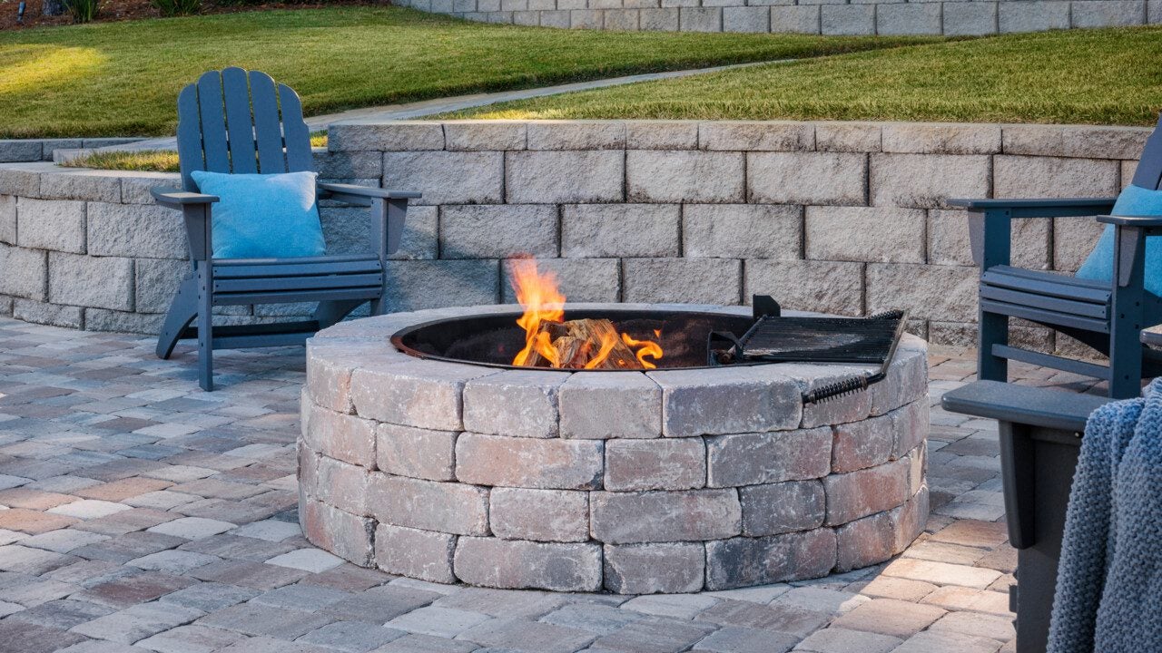 natural stone paver seating wall fire pit and patio