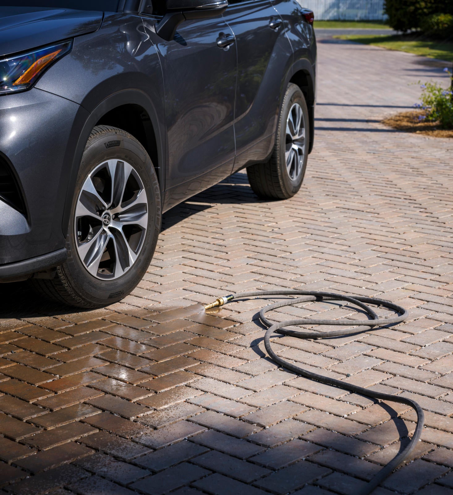 car wash on paver driveway