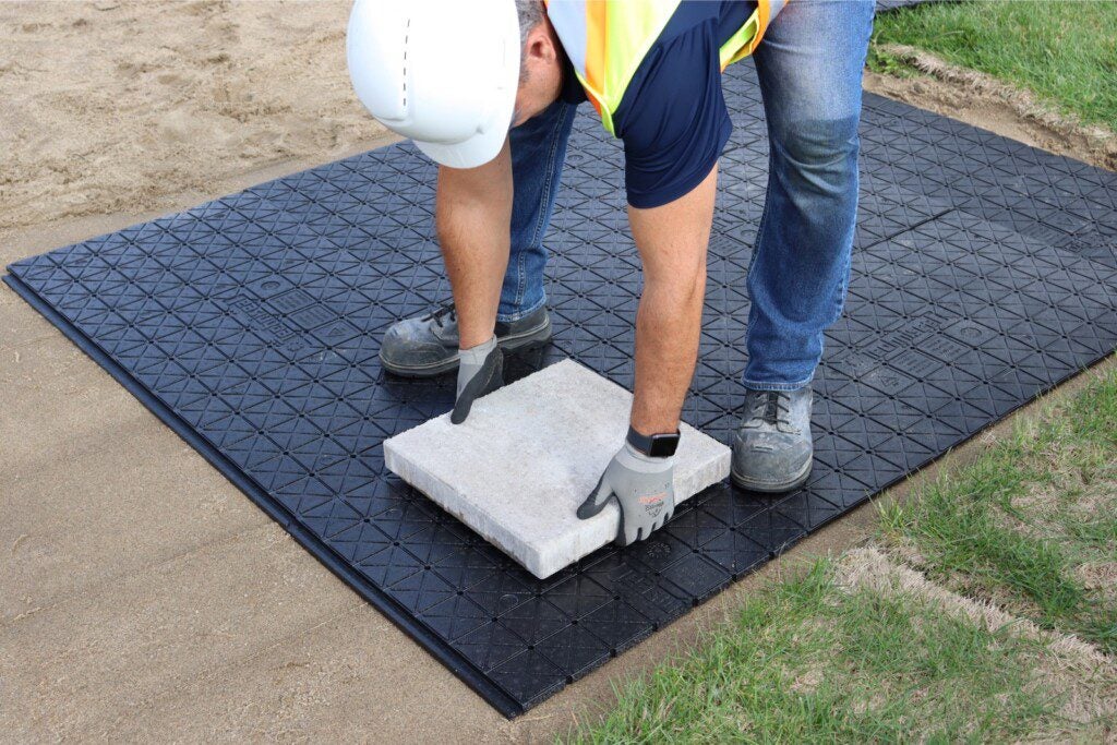 Contractor using Techniseal paver base