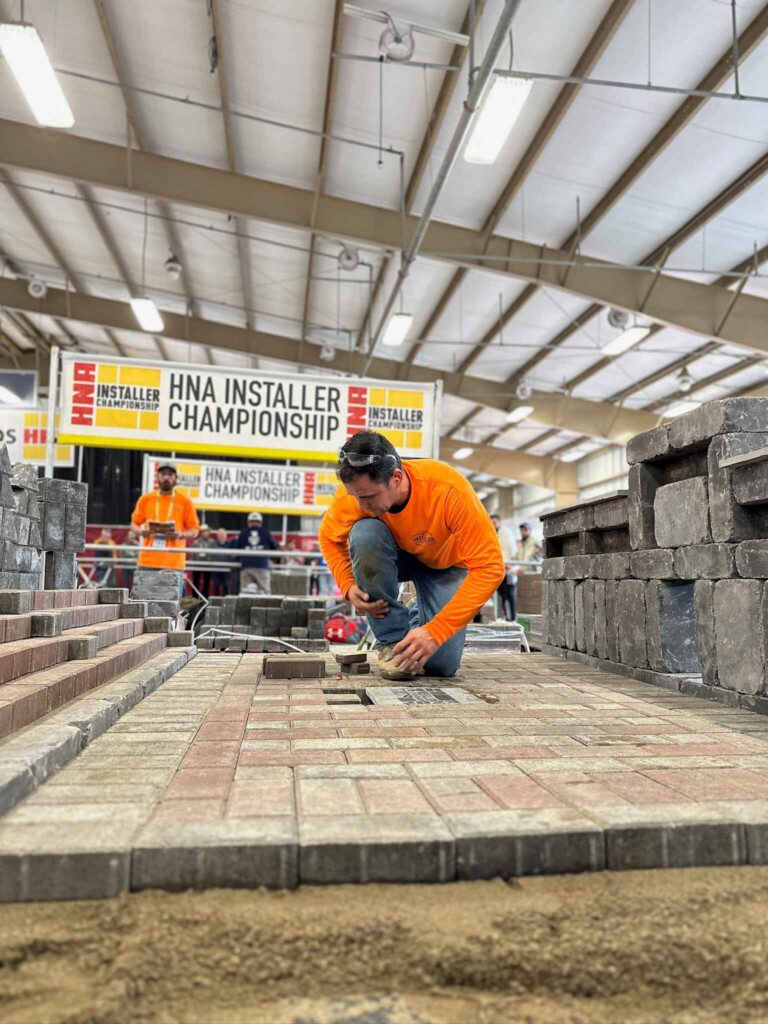 Installer with pavers at HNA 2023 Installer Championship