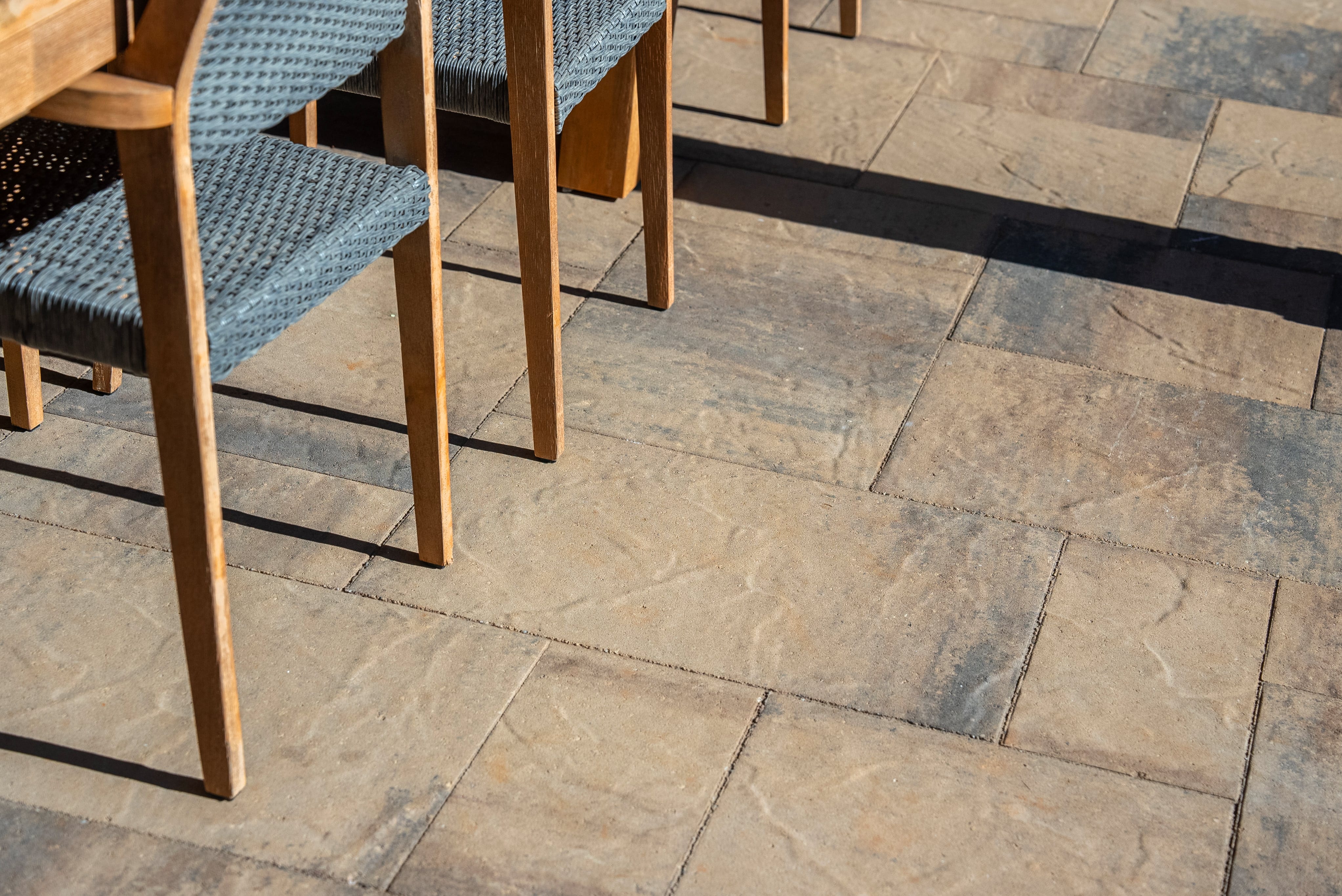 details of the pavers with two chairs in the top left corner