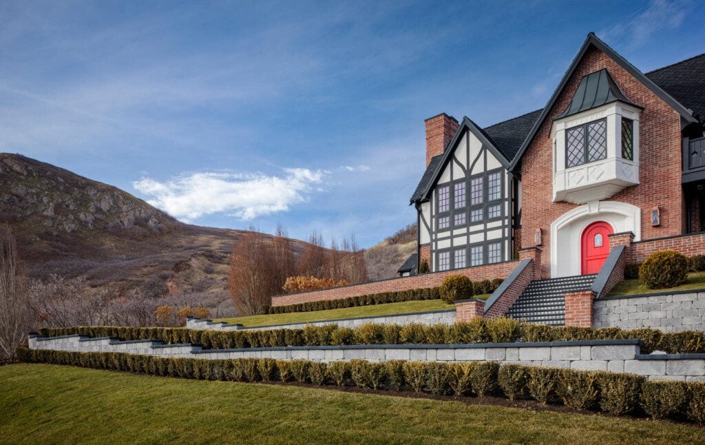 Tan France home in Utah featuring Belgard pavers