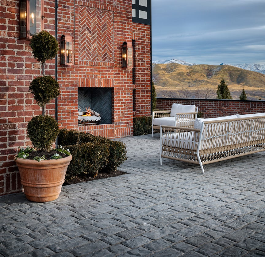 New residence in Salt Lake City, Utah designed by influencer, Tan France, includes hardscapes with Belgard Charlestone Pavers.