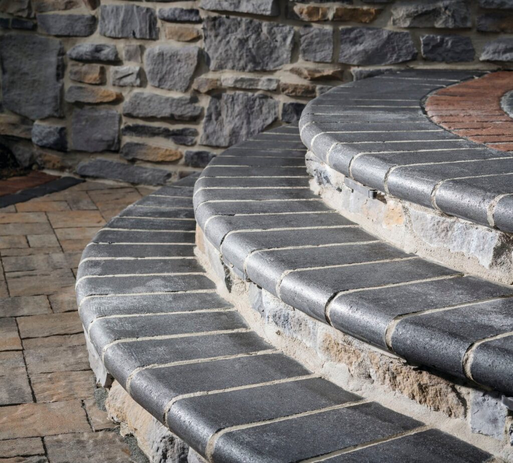 rustic stone outdoor steps with bullnose coping