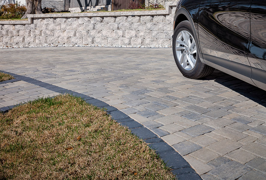driveway with border against grass