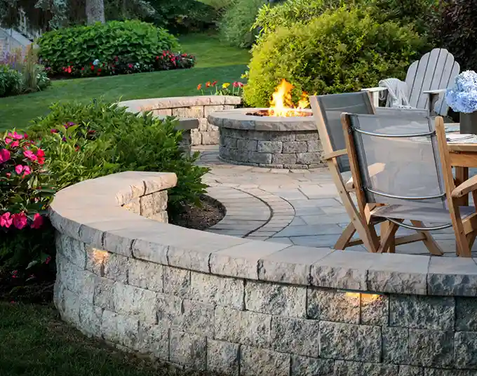retaining wall with seating around patio